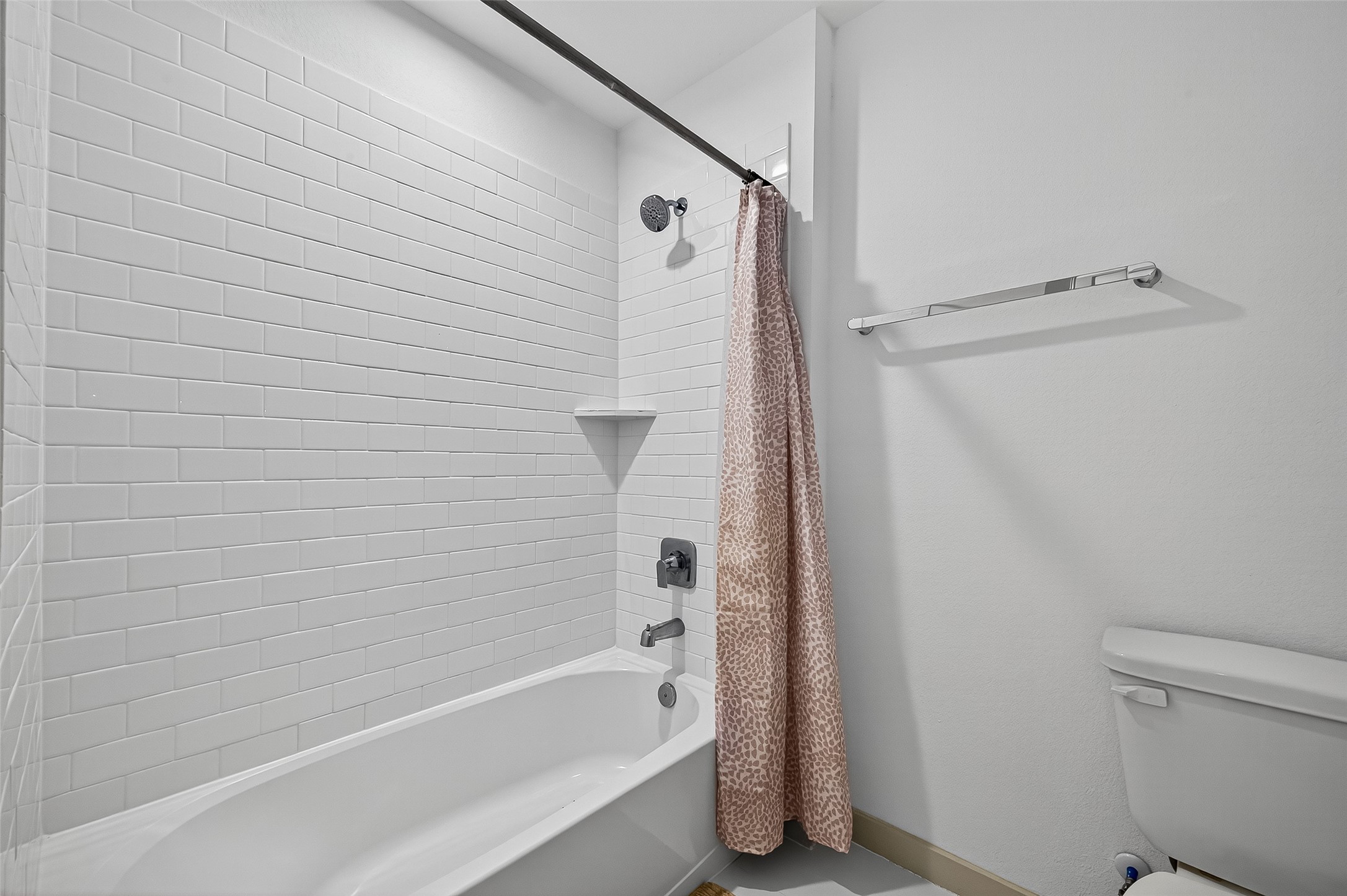 31410 Hexan Heights Lane Fulshear, TX 77441 - Photo 26 of 50 a bathroom with a bathtub and a shower