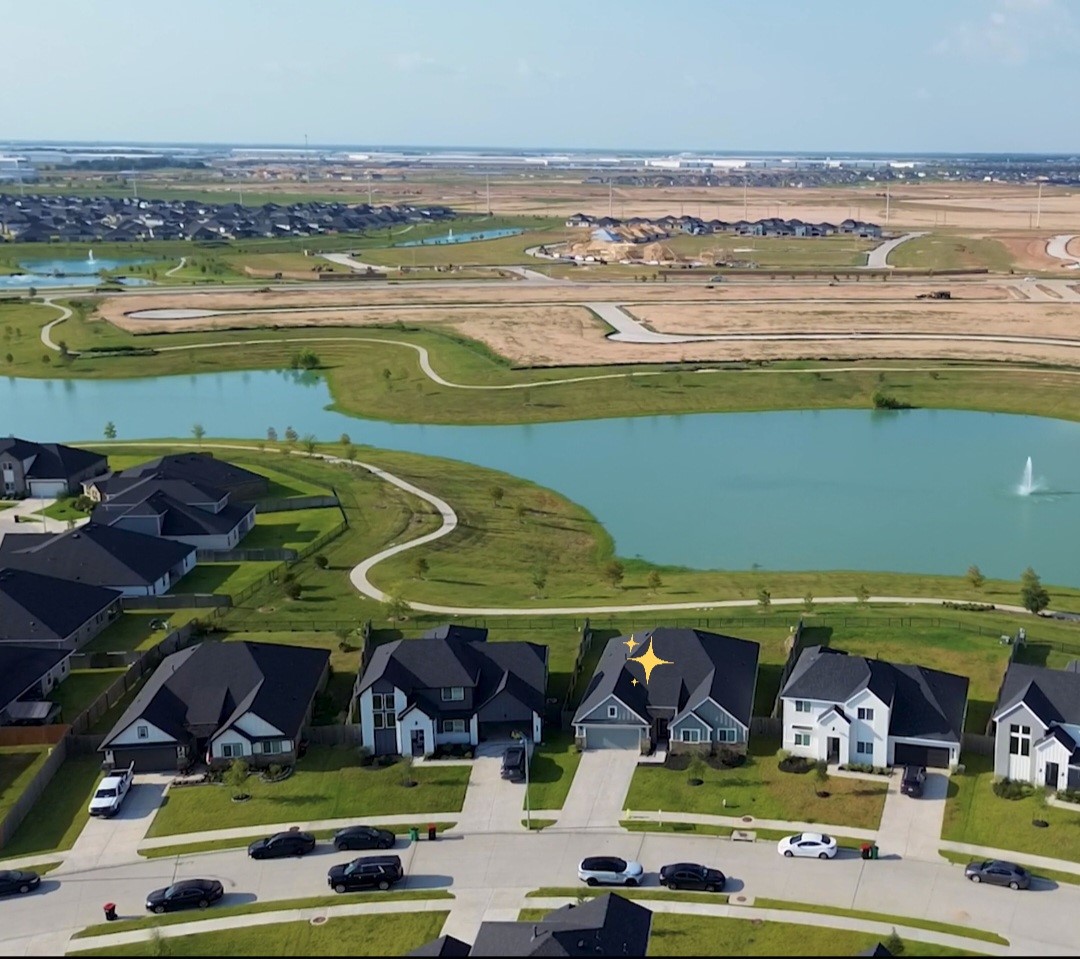 31410 Hexan Heights Lane Fulshear, TX 77441 - Photo 3 of 50 a view of an ocean with beach