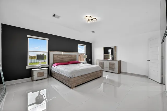 a room with a dresser in it