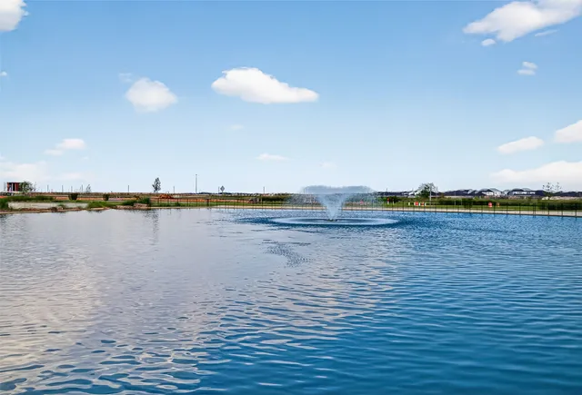 a view of a garden with a apartment