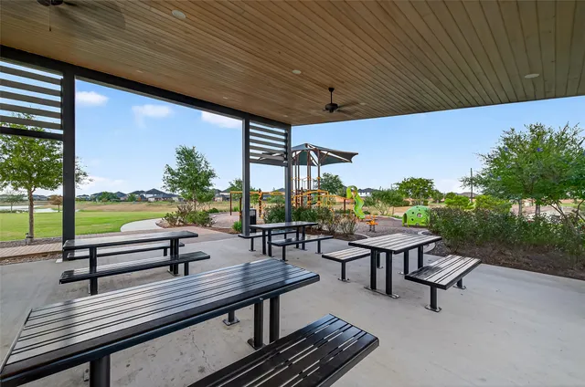 a house view with a outdoor seating space