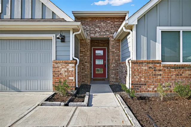 a front view of a building with glass windows