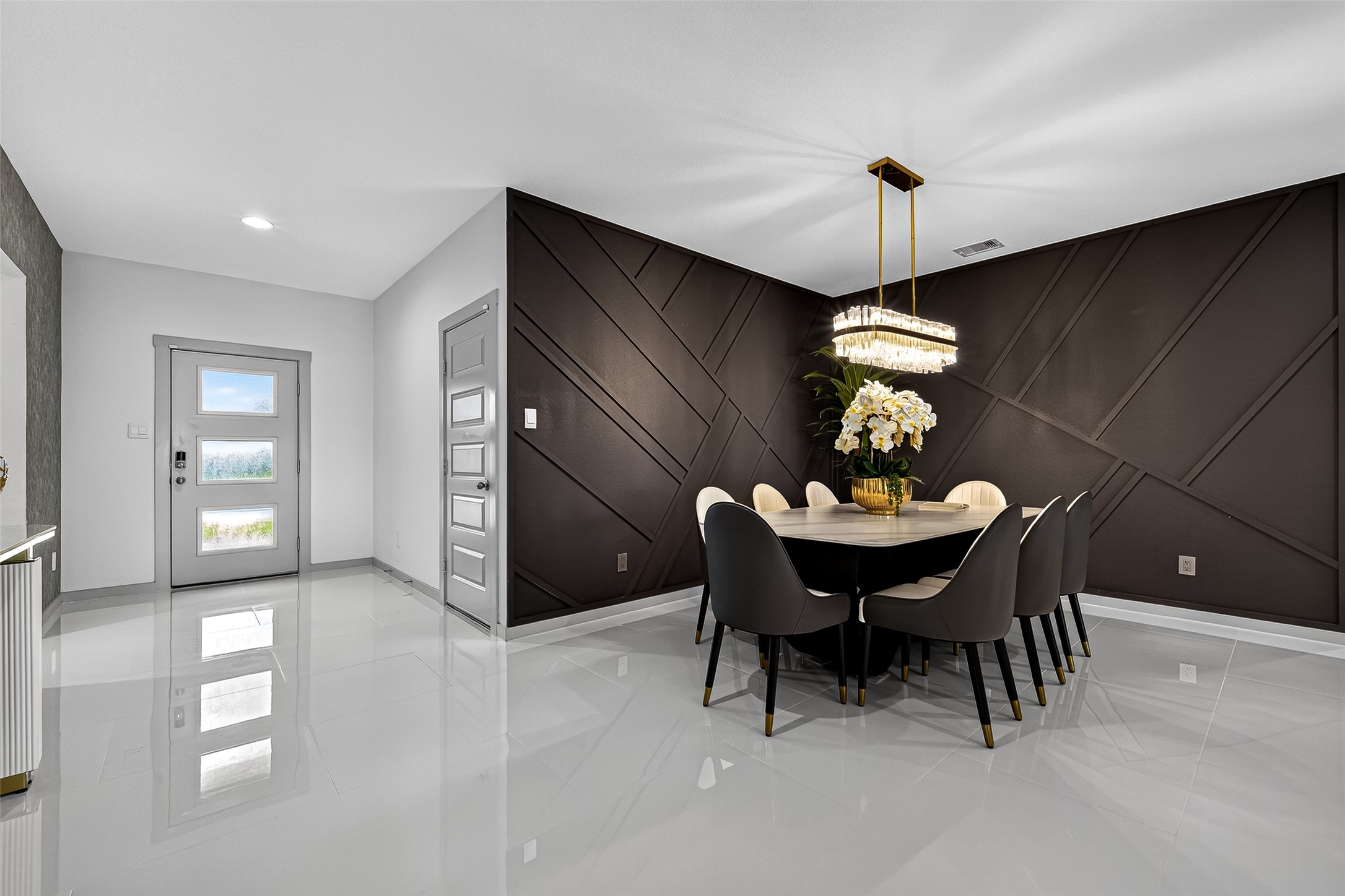 31410 Hexan Heights Lane Fulshear, TX 77441 - Photo 10 of 50 a view of a dining room with furniture and chandelier