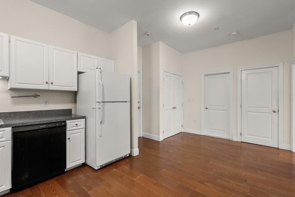 7 Main Street, Unit 102 Brockton, MA 02301 - Photo 11 of 31 a view of a kitchen with electric appliances