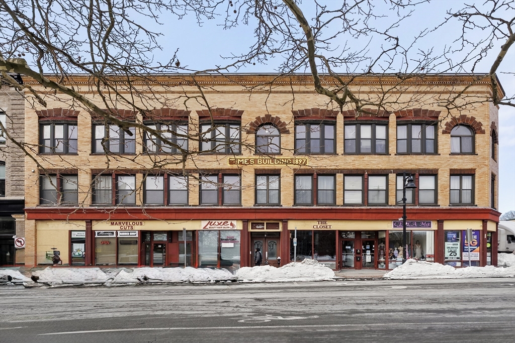 7 Main Street, Unit 102 Brockton, MA 02301 - Photo 30 of 31 front view of a building with a street