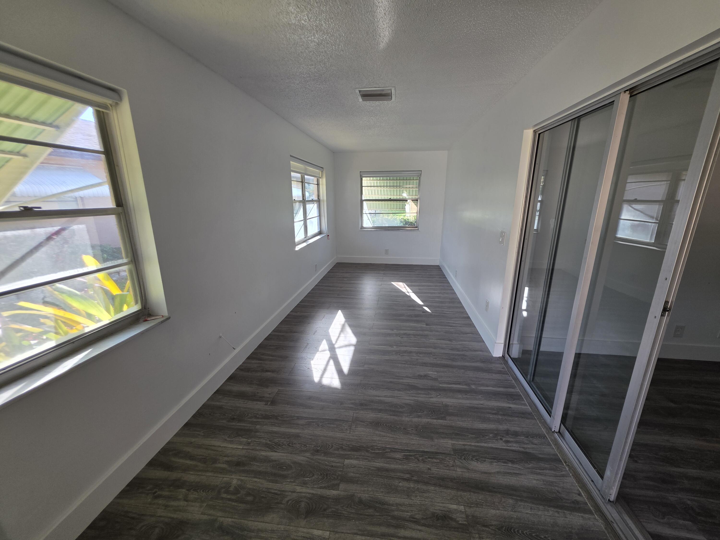 718 Whippoorwill Lane Delray Beach, FL 33445 - Photo 26 of 37 Florida Room