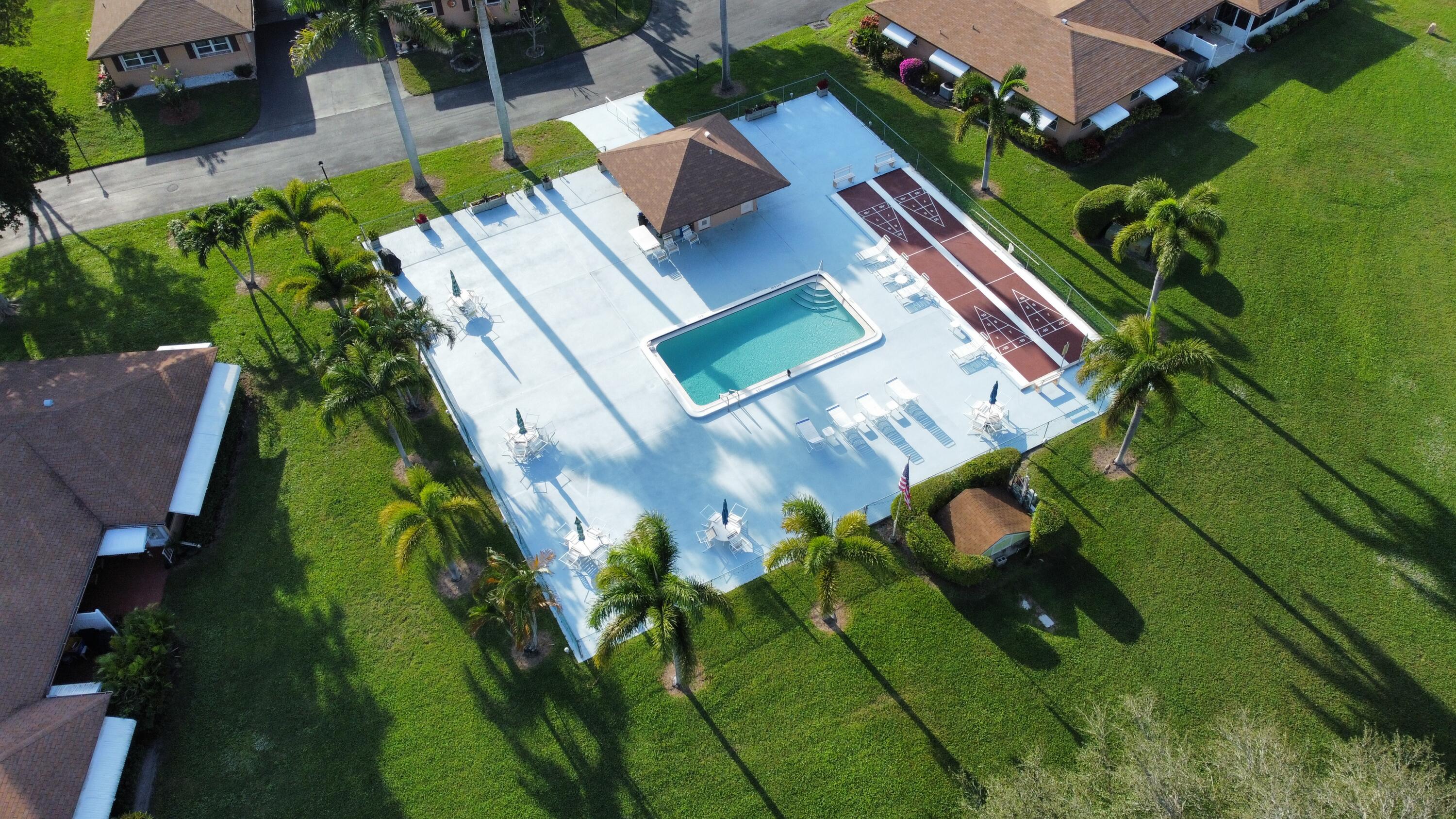 718 Whippoorwill Lane Delray Beach, FL 33445 - Photo 34 of 37 Pool area