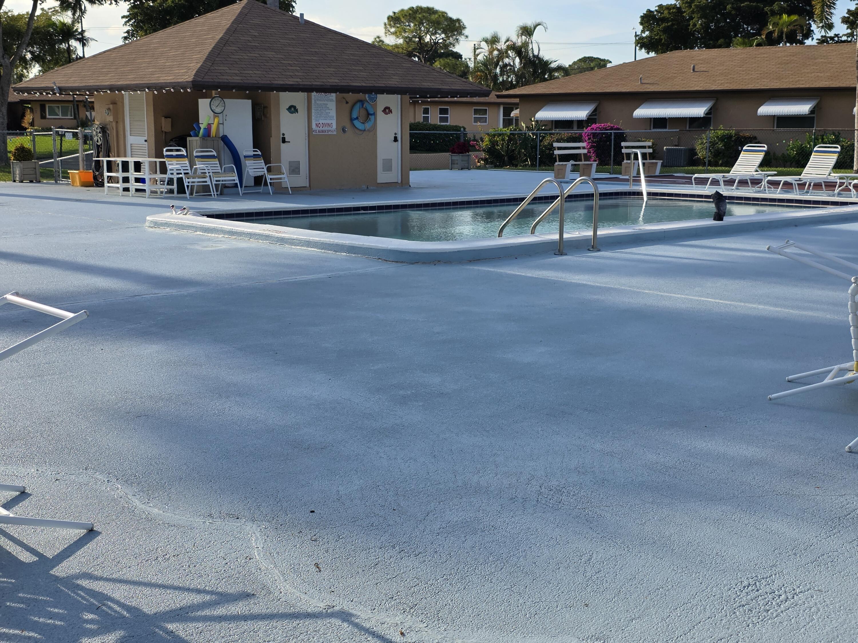 718 Whippoorwill Lane Delray Beach, FL 33445 - Photo 36 of 37 Pool area