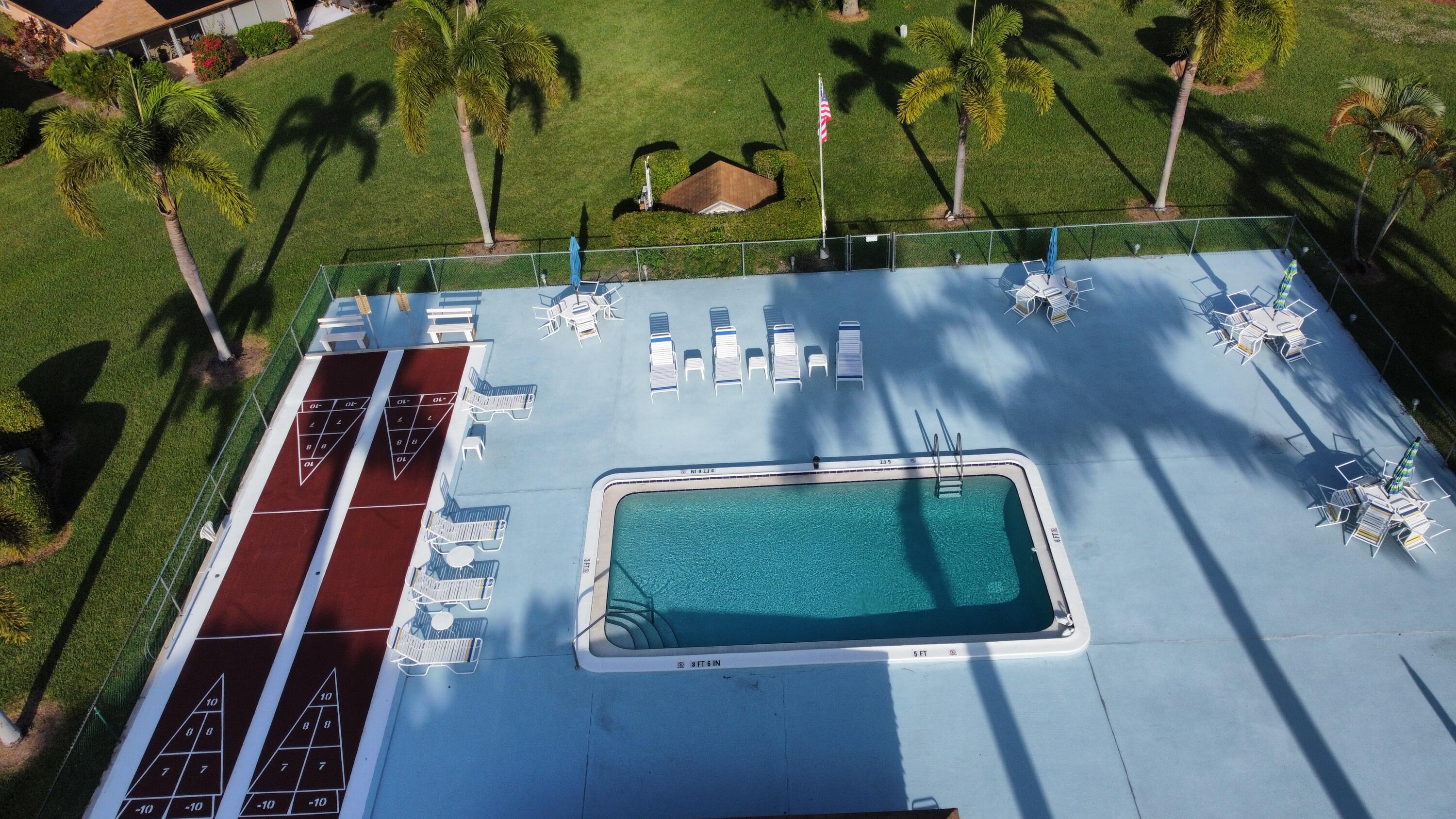718 Whippoorwill Lane Delray Beach, FL 33445 - Photo 37 of 37 Pool area