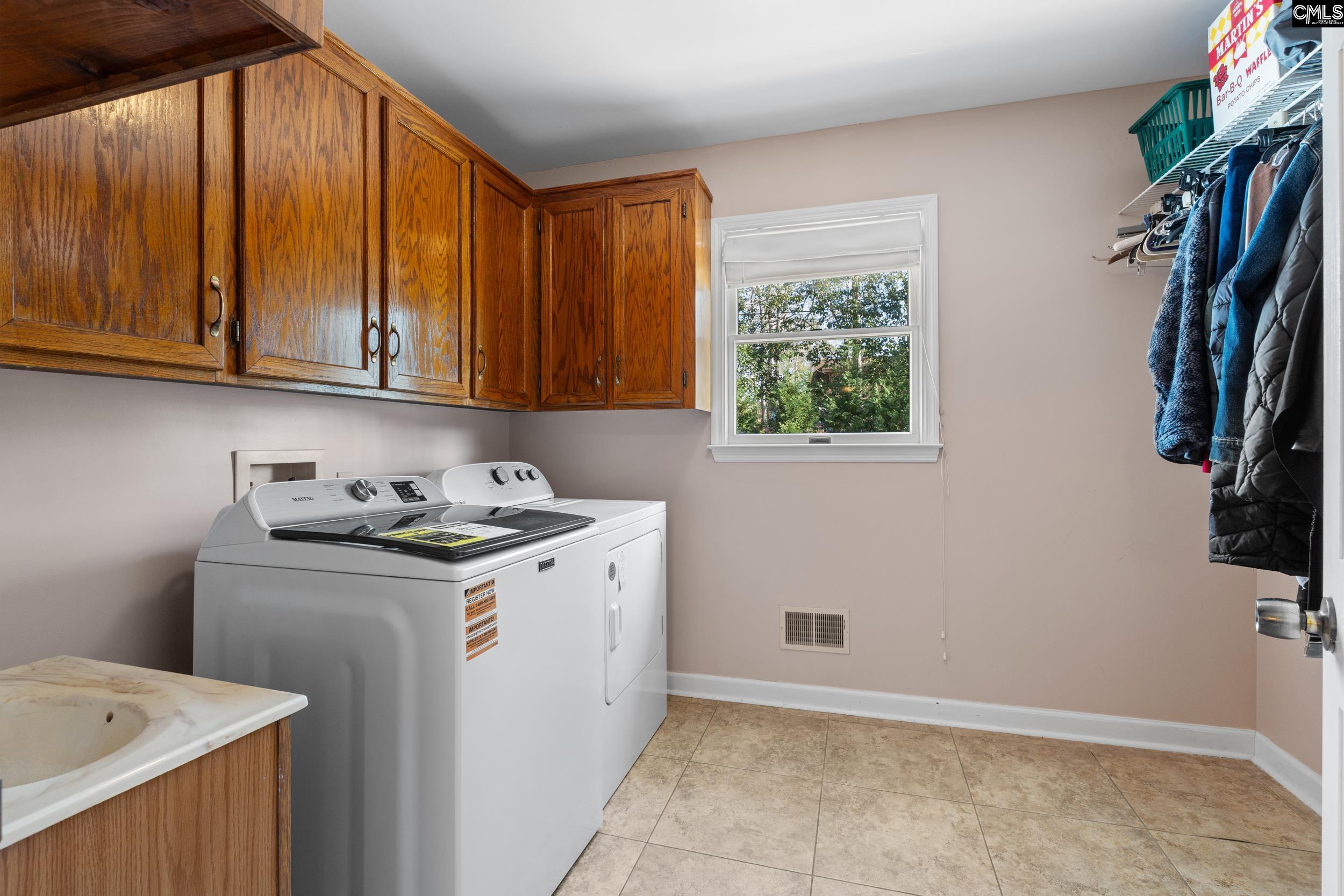 115 Rocky Ridge Road Leesville, SC 29070 - Photo 26 of 51 a utility room with dryer and washer