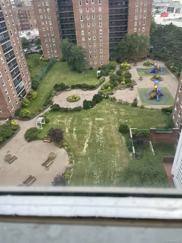 a view of a garage with stainless steel appliances