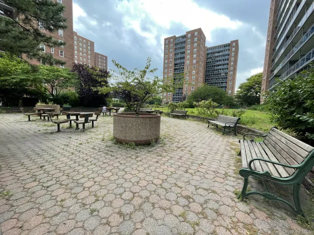 a close view of a sink a stove and a mirror