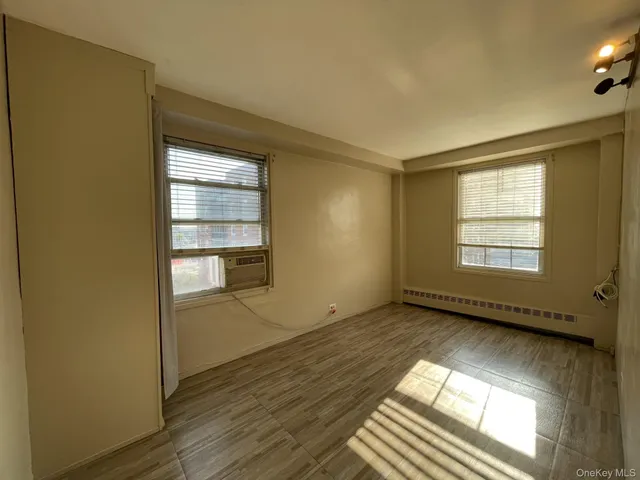 a view of an empty room and window