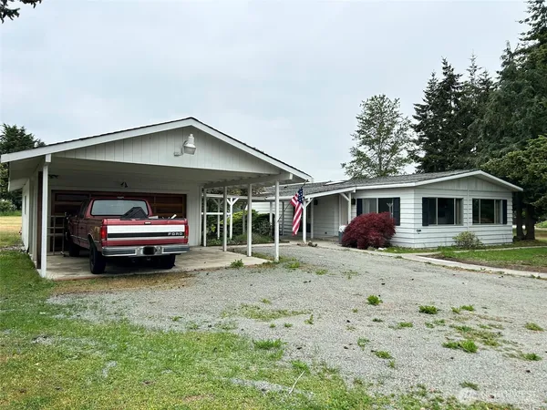 a car parked in front of a house