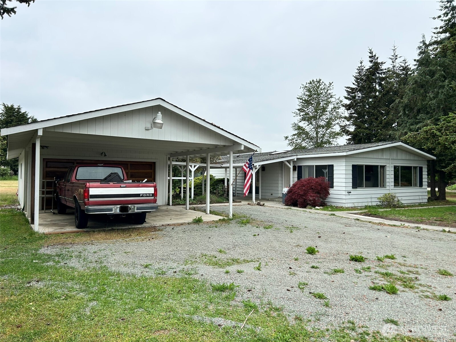 791 Elliot Court Sequim, WA 98382 - Photo 1 of 37 a car parked in front of a house