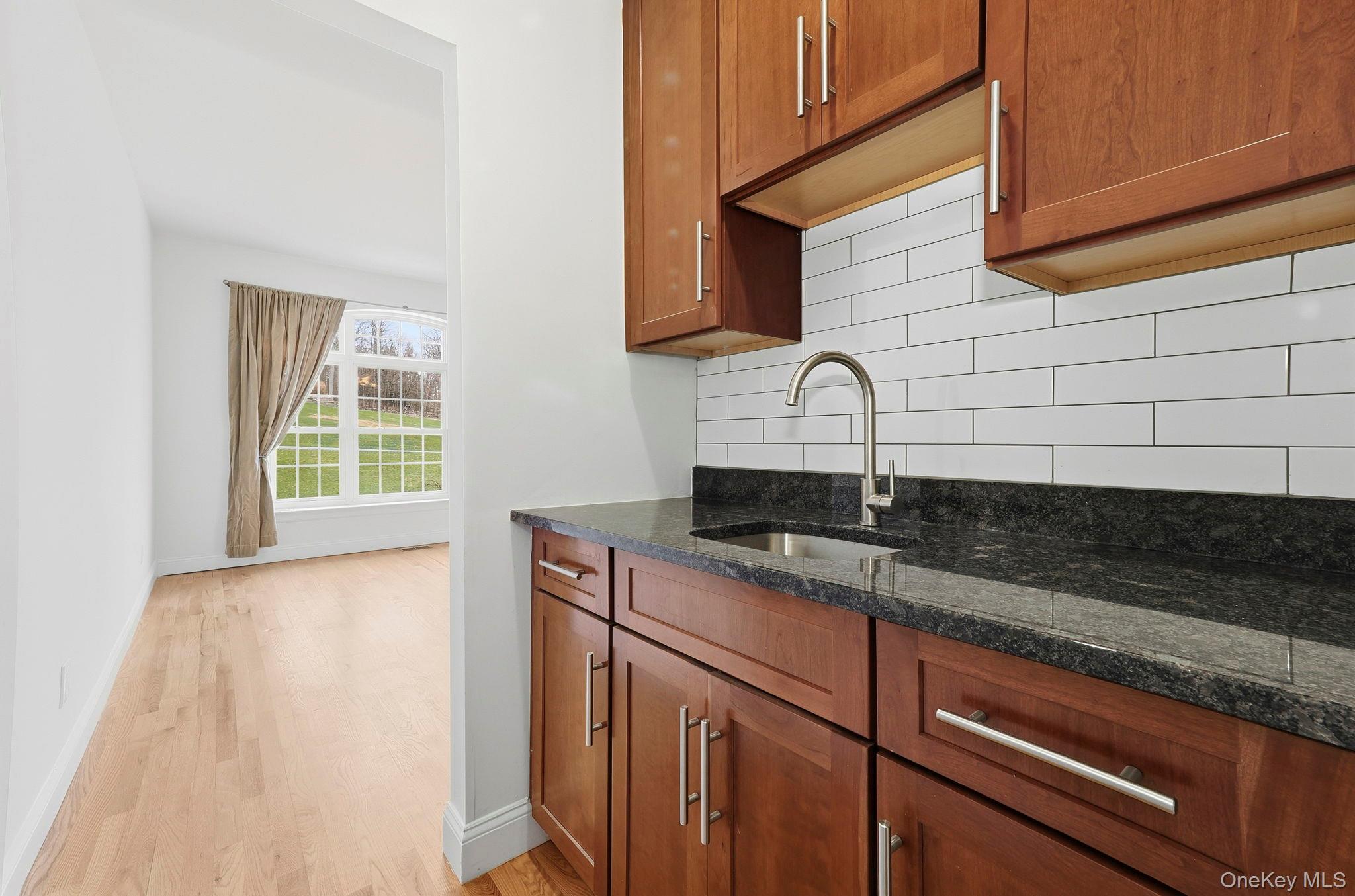 37 Willets Way Newburgh, NY 12550 - Photo 19 of 48 a kitchen with a sink and cabinets