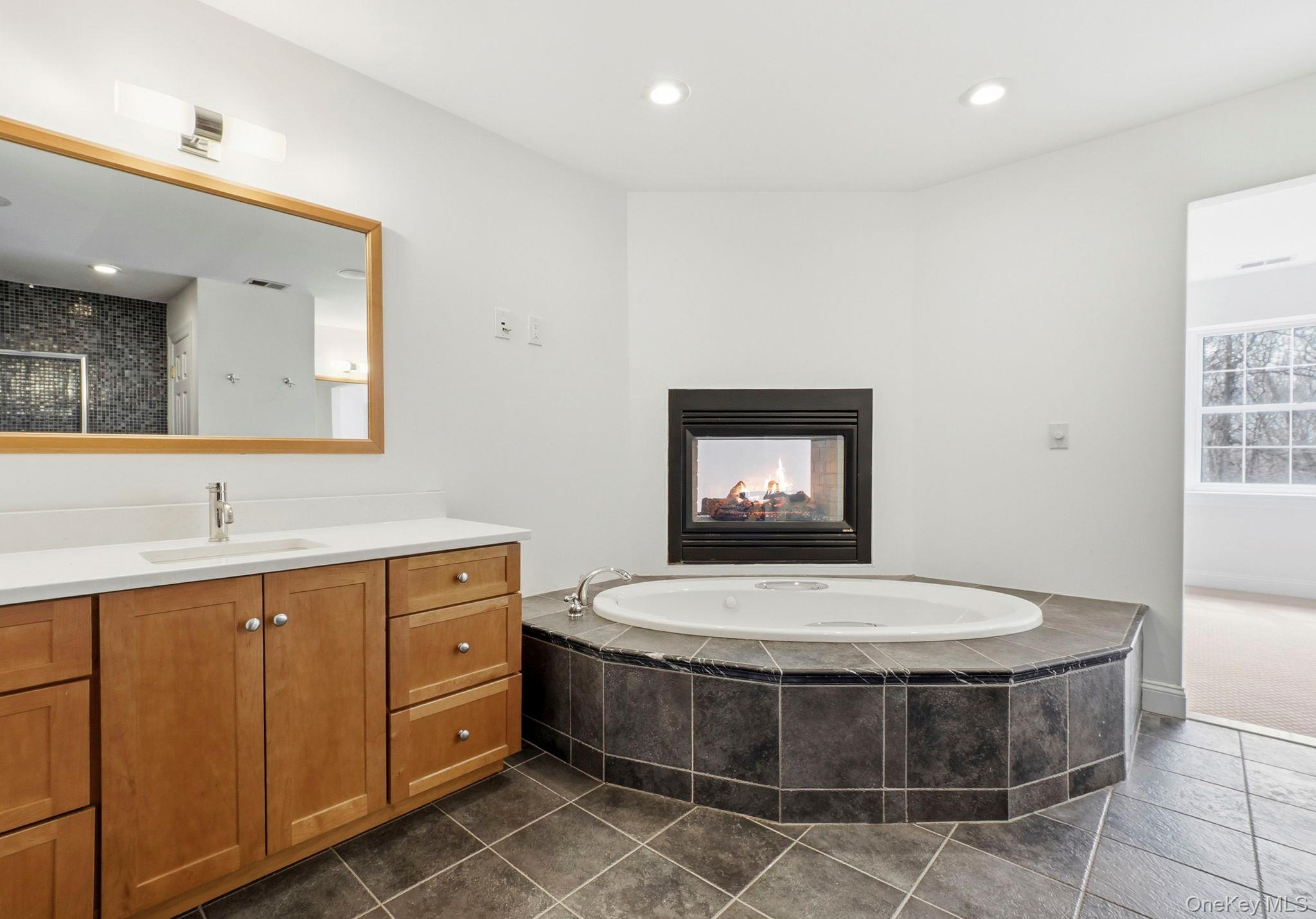 37 Willets Way Newburgh, NY 12550 - Photo 28 of 48 a room with a mirror and a sink