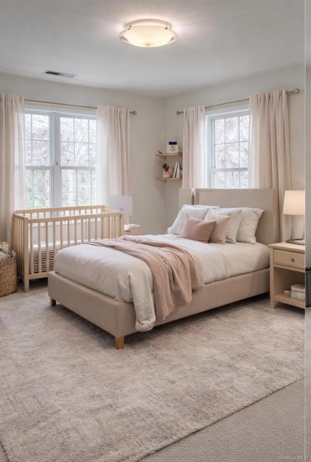 37 Willets Way Newburgh, NY 12550 - Photo 33 of 48 a bedroom with a bed couch and a large window