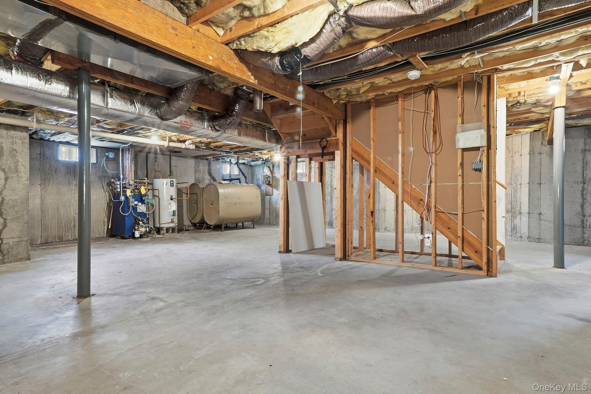 37 Willets Way Newburgh, NY 12550 - Photo 40 of 48 a view of an empty room with wooden walls