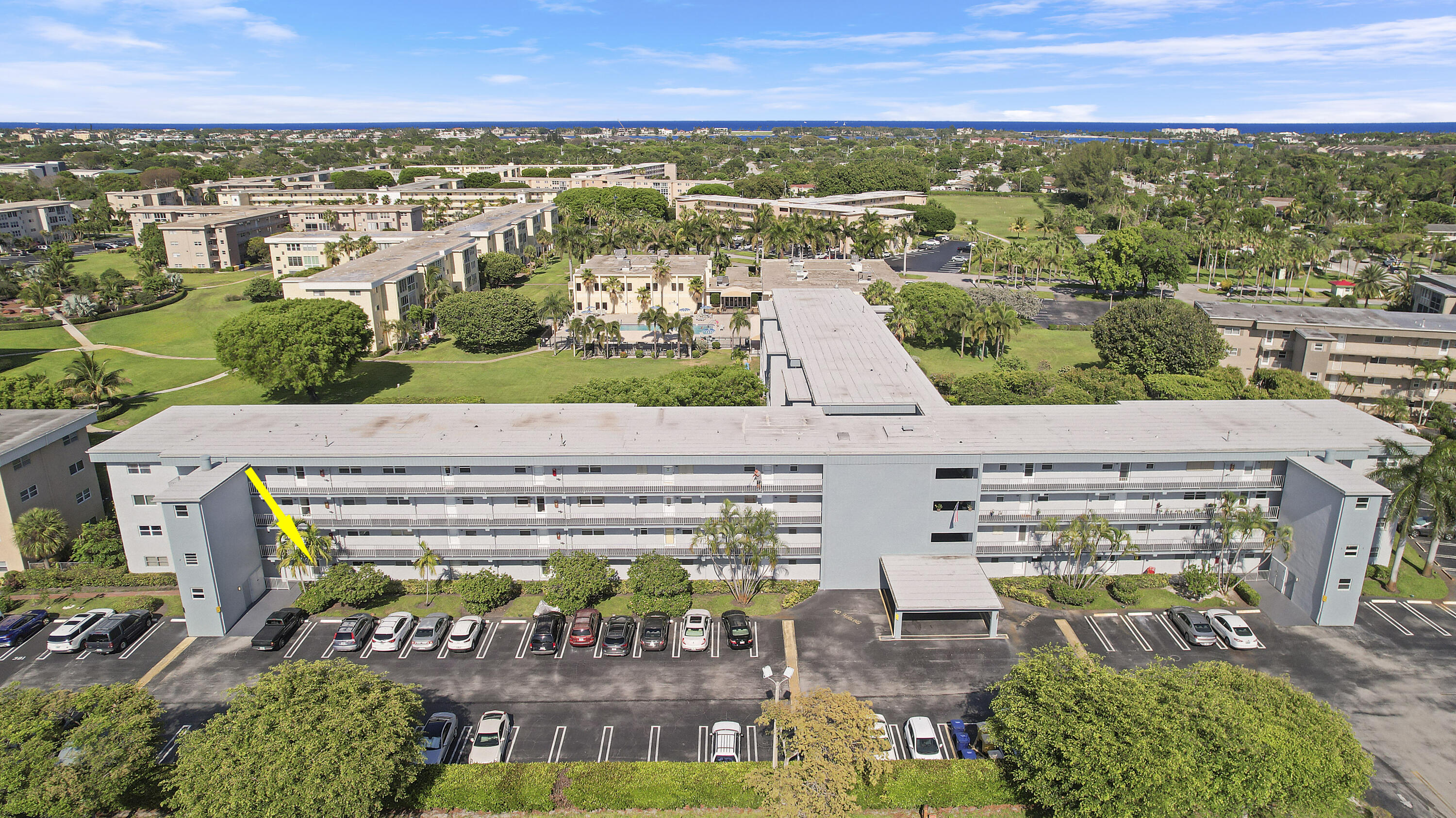 2400 Northeast 1st Lane, Unit 1020 Boynton Beach, FL 33435 - Photo 2 of 34 an aerial view of a house with a outdoor space