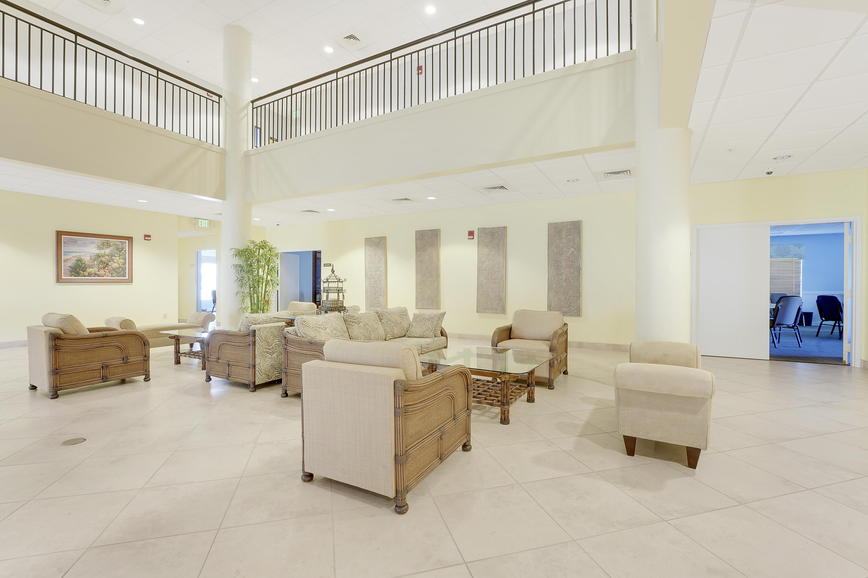 2400 Northeast 1st Lane, Unit 1020 Boynton Beach, FL 33435 - Photo 23 of 34 a living room with furniture and a large window