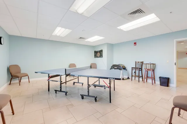 a view of a livingroom with furniture