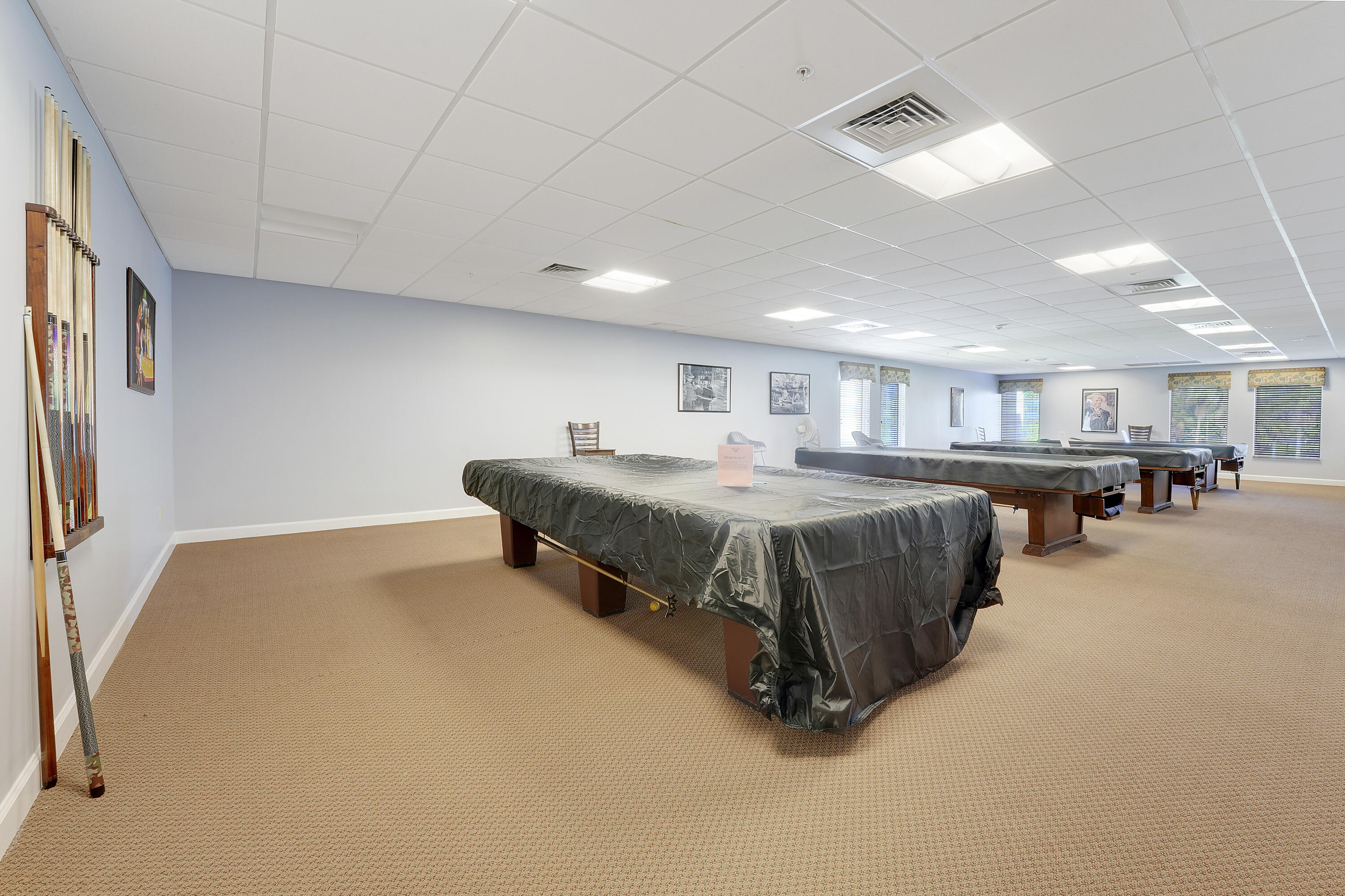 2400 Northeast 1st Lane, Unit 1020 Boynton Beach, FL 33435 - Photo 25 of 34 a spacious bedroom with a bed and window