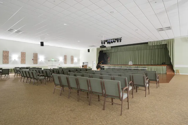 a view of a workspace with furniture