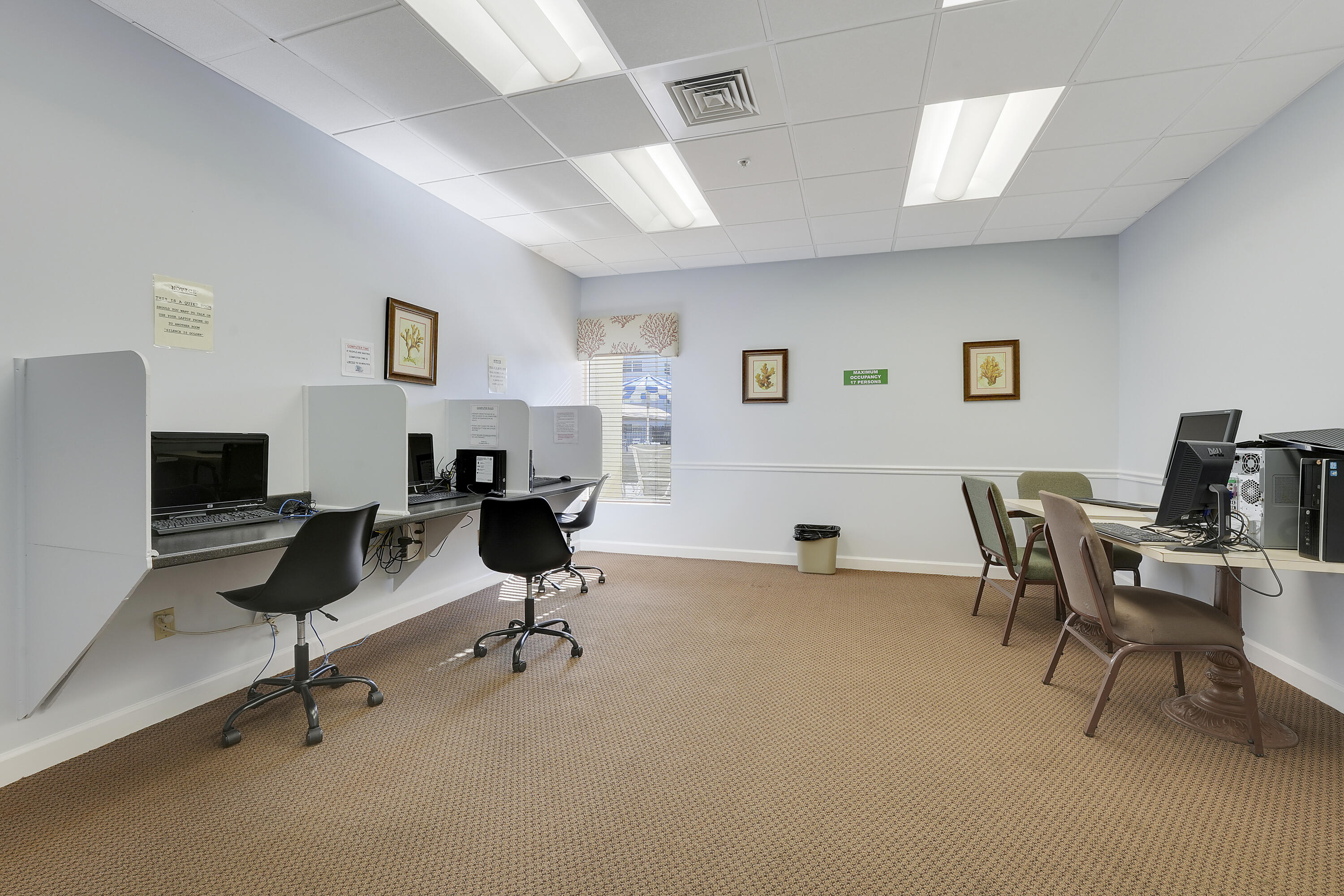 2400 Northeast 1st Lane, Unit 1020 Boynton Beach, FL 33435 - Photo 29 of 34 a view of a workspace with furniture