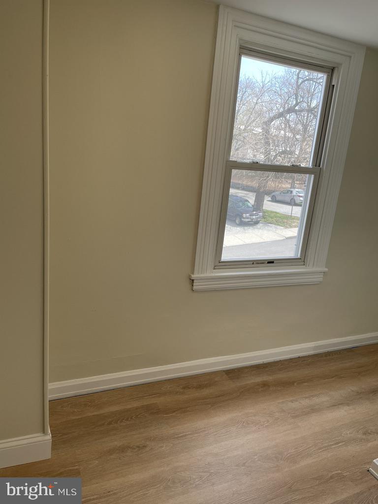 201 Simpson Road Ardmore, PA 19003 - Photo 16 of 37 a view of a small space with wooden floor and a window