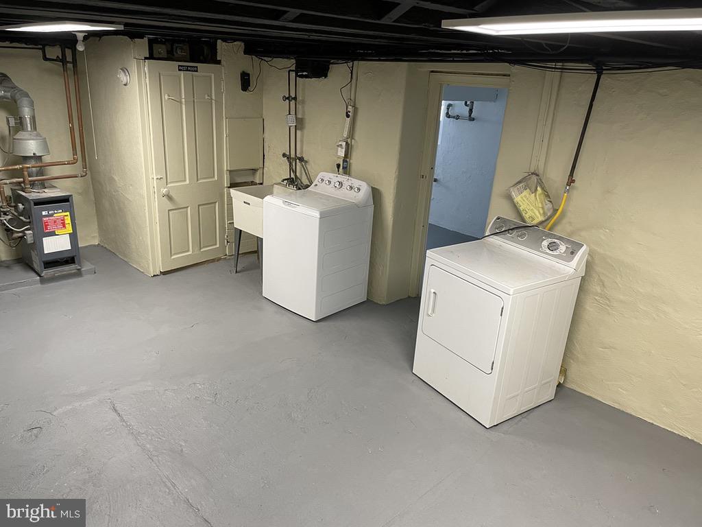 201 Simpson Road Ardmore, PA 19003 - Photo 32 of 37 a utility room with dryer and washer