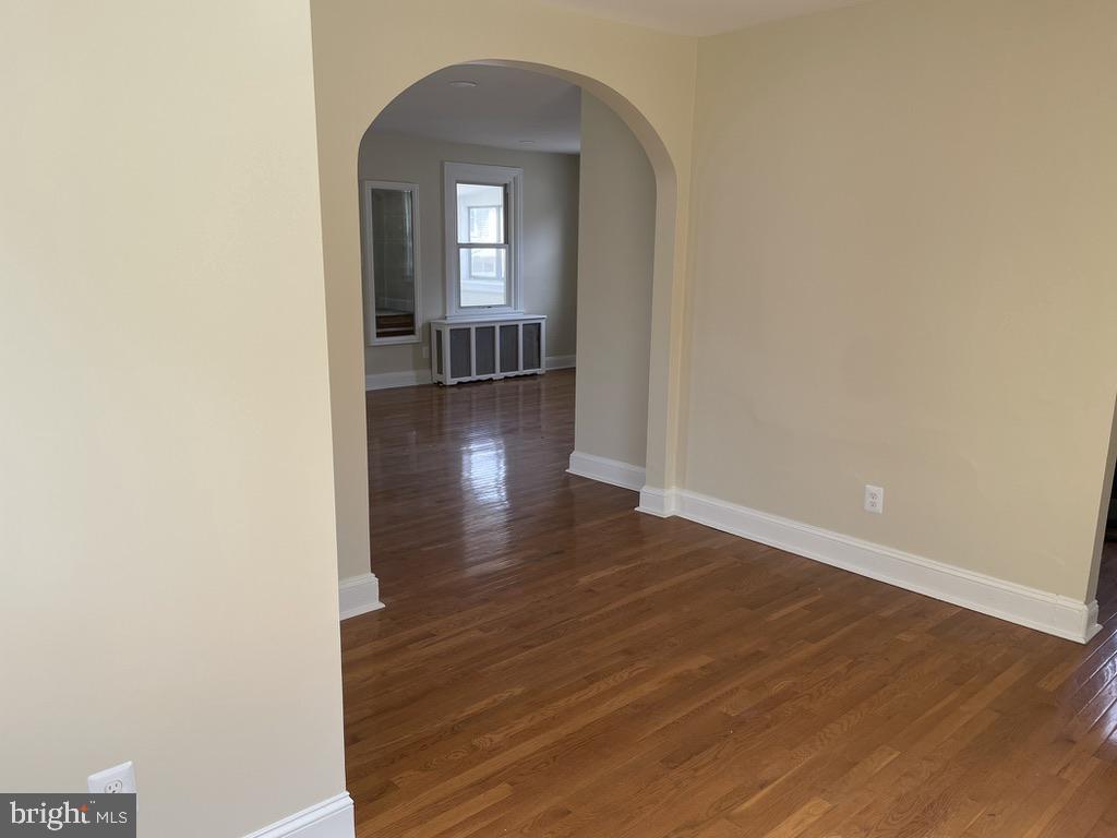 201 Simpson Road Ardmore, PA 19003 - Photo 9 of 37 a view of a room with wooden floor and a small view