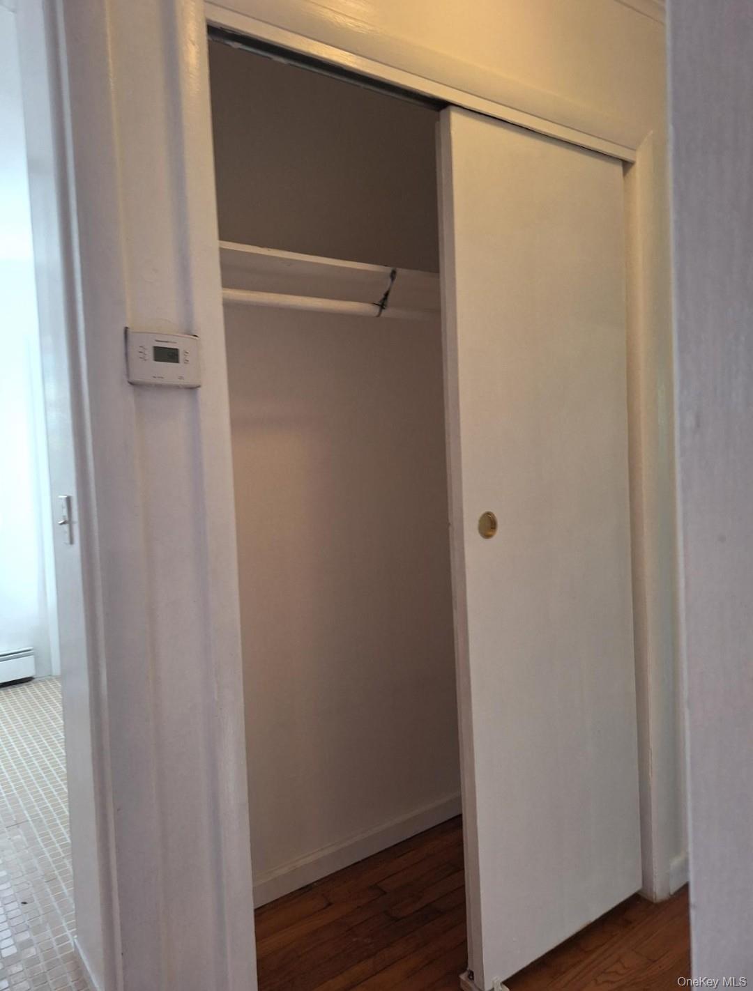 652 Highway 211, Unit 1 Middletown, NY 10940 - Photo 12 of 18 a bathroom with a glass shower door