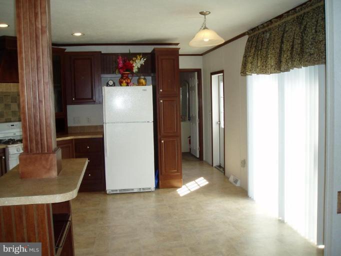 1319 Evering Avenue Rosedale, MD 21237 - Photo 5 of 15 Spacious Kitchen/Dining Area. New Whirlpool Refrig
