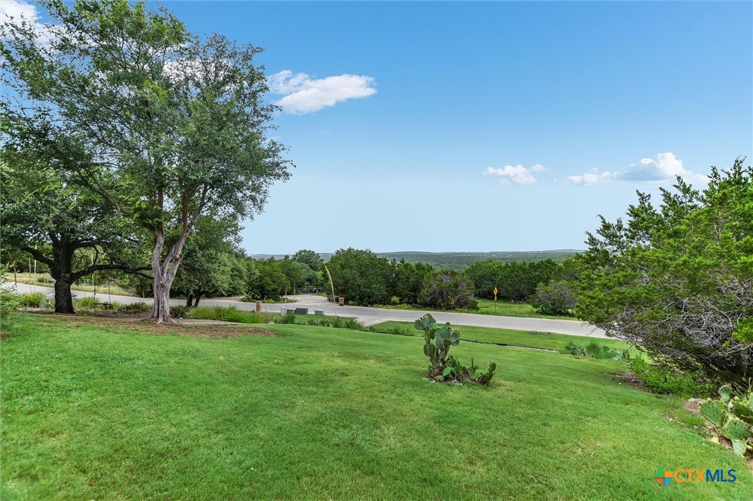 60 Crazy Cross Road Wimberley, TX 78676 - Photo 3 of 20 Mature trees and fabulous view from the front.