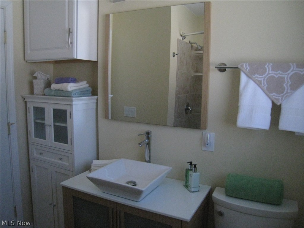 7160 Liberty Road Solon, OH 44139 - Photo 9 of 26 Bathroom on the main level completely remodeled with the latest design.