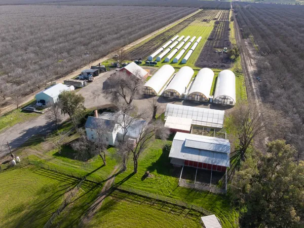 an aerial view of a house with a garden