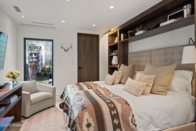 a bedroom with a bed and closet