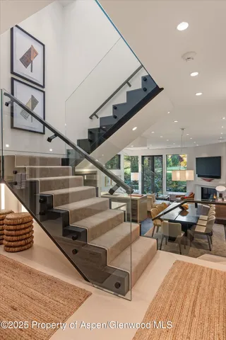 a picture of a bathroom with mirror and window