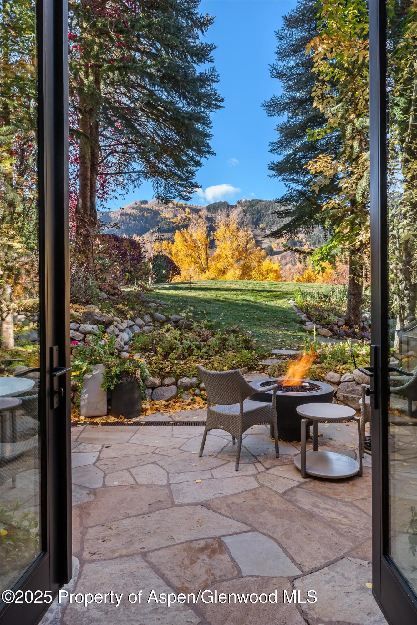 155 Lone Pine Road, Unit 12 Aspen, CO 81611 - Photo 30 of 37 a view of a outdoor space with seating area