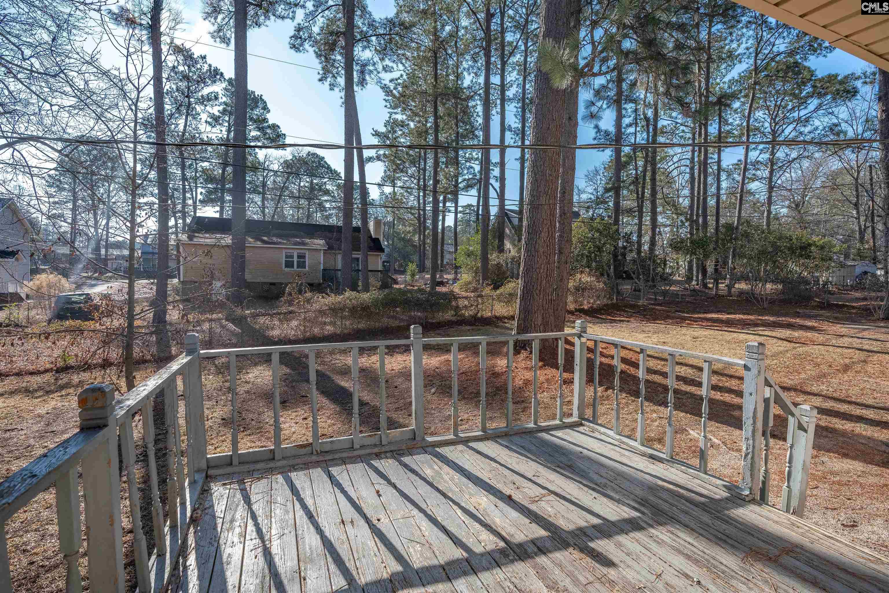 2620 Pleasant Ridge Drive Columbia, SC 29209 - Photo 35 of 37 a view of a balcony with wooden floor and fence