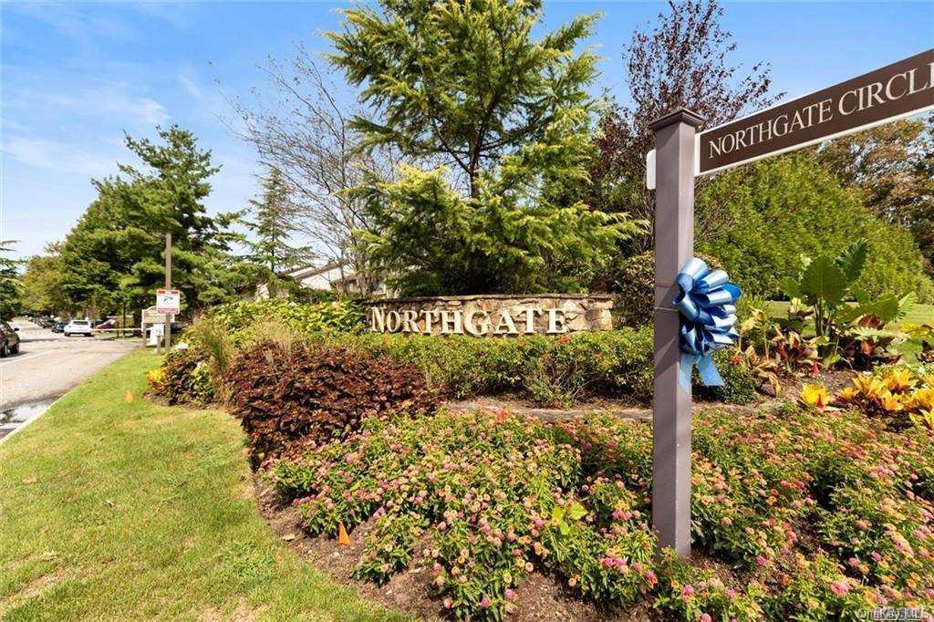 51 Northgate Circle Melville, NY 11747 - Photo 1 of 1 a street sign on a tree