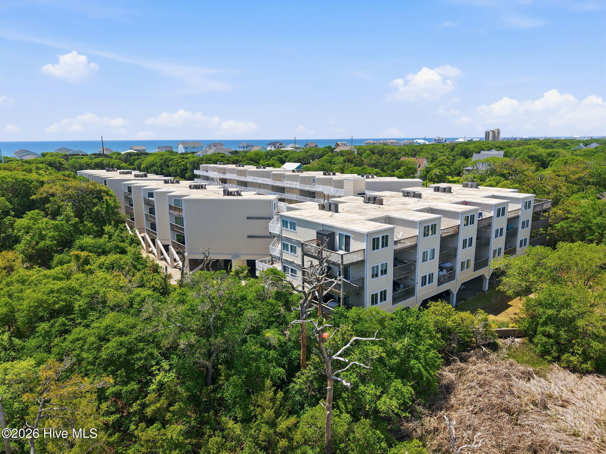 650 Salter Path Road, Unit 214 Pine Knoll Shores, NC 28512 - Photo 5 of 47 5-web-or-mls-DJI_20260506121732_0197_D