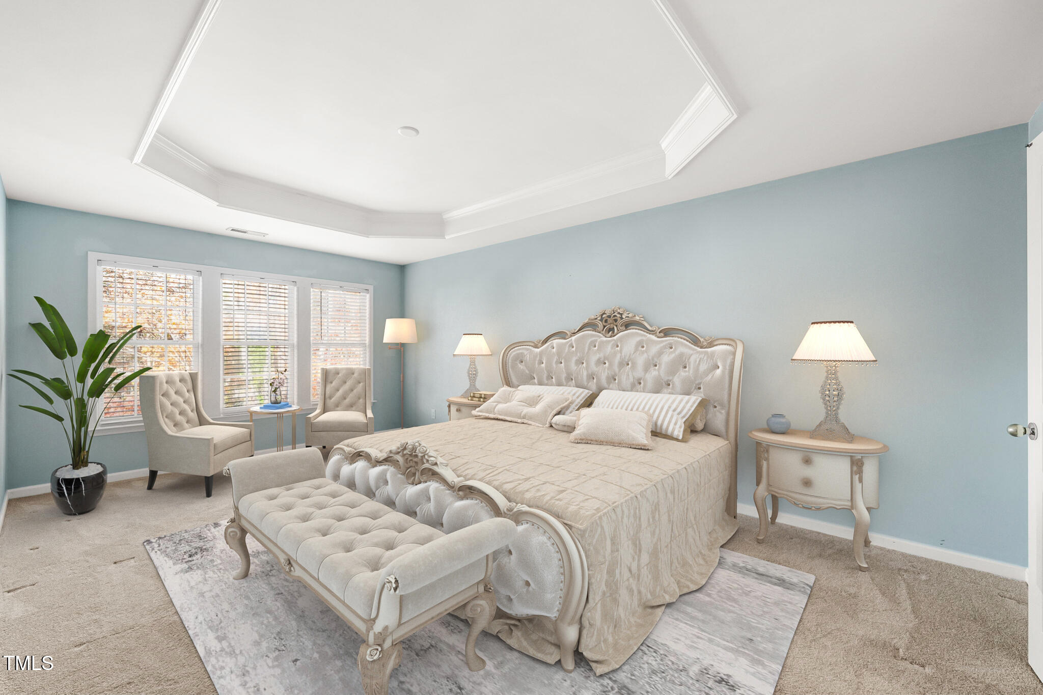 3614 Lion Ridge Court Raleigh, NC 27612 - Photo 8 of 52 a bedroom with a large bed and a couch