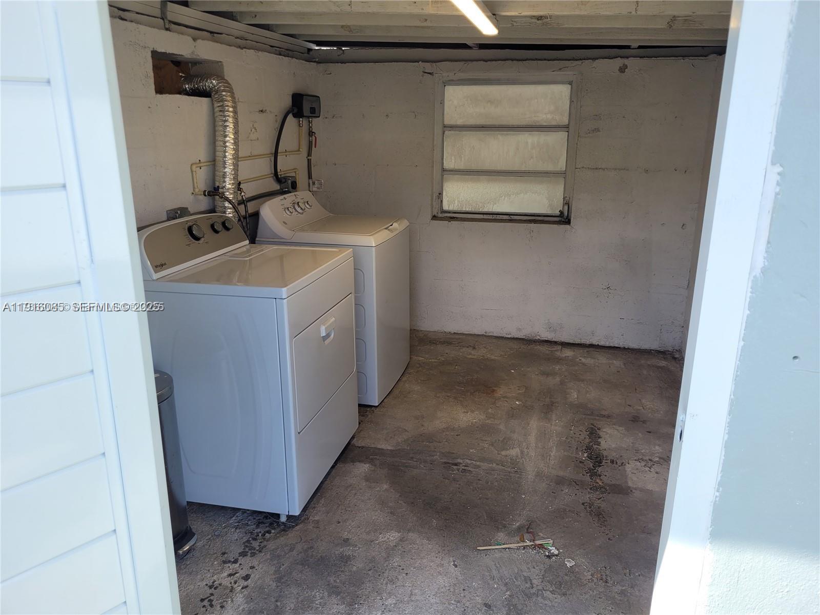 637 West 31st Street Hialeah, FL 33012 - Photo 20 of 20 a bathroom with a sink and mirror