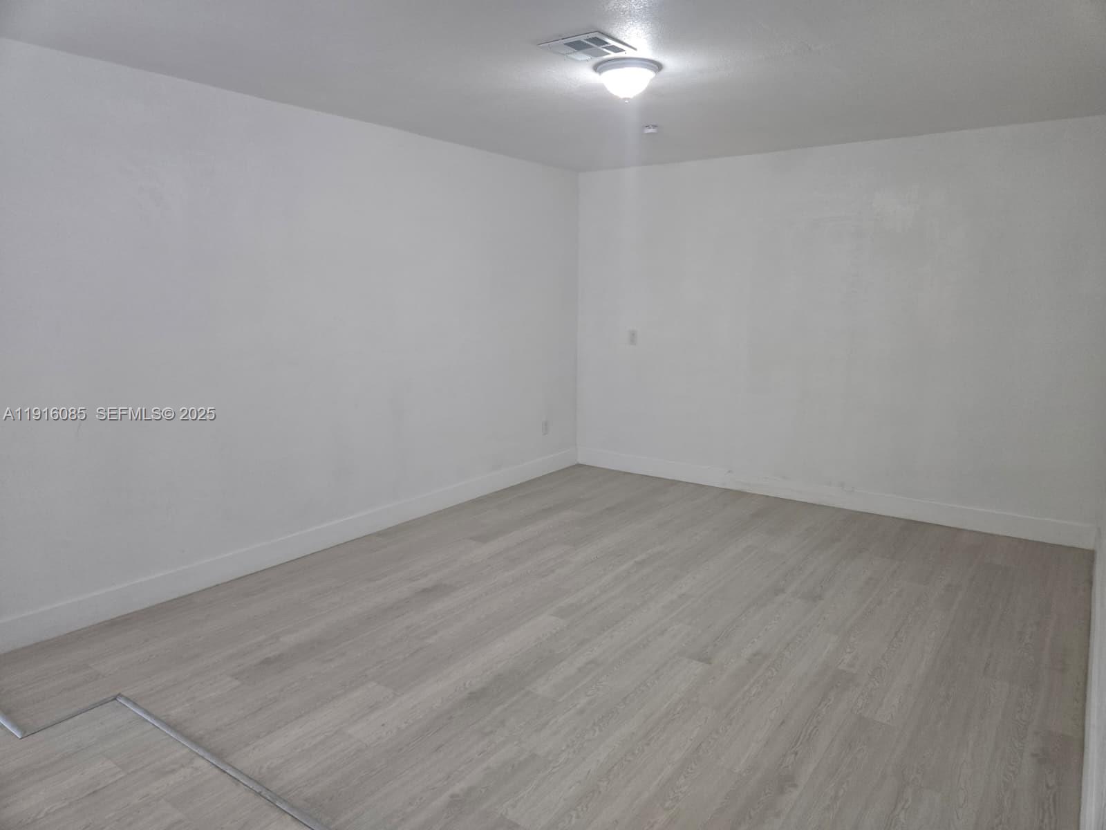 637 West 31st Street Hialeah, FL 33012 - Photo 8 of 20 a view of a room