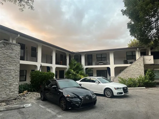 a car parked in front of a house