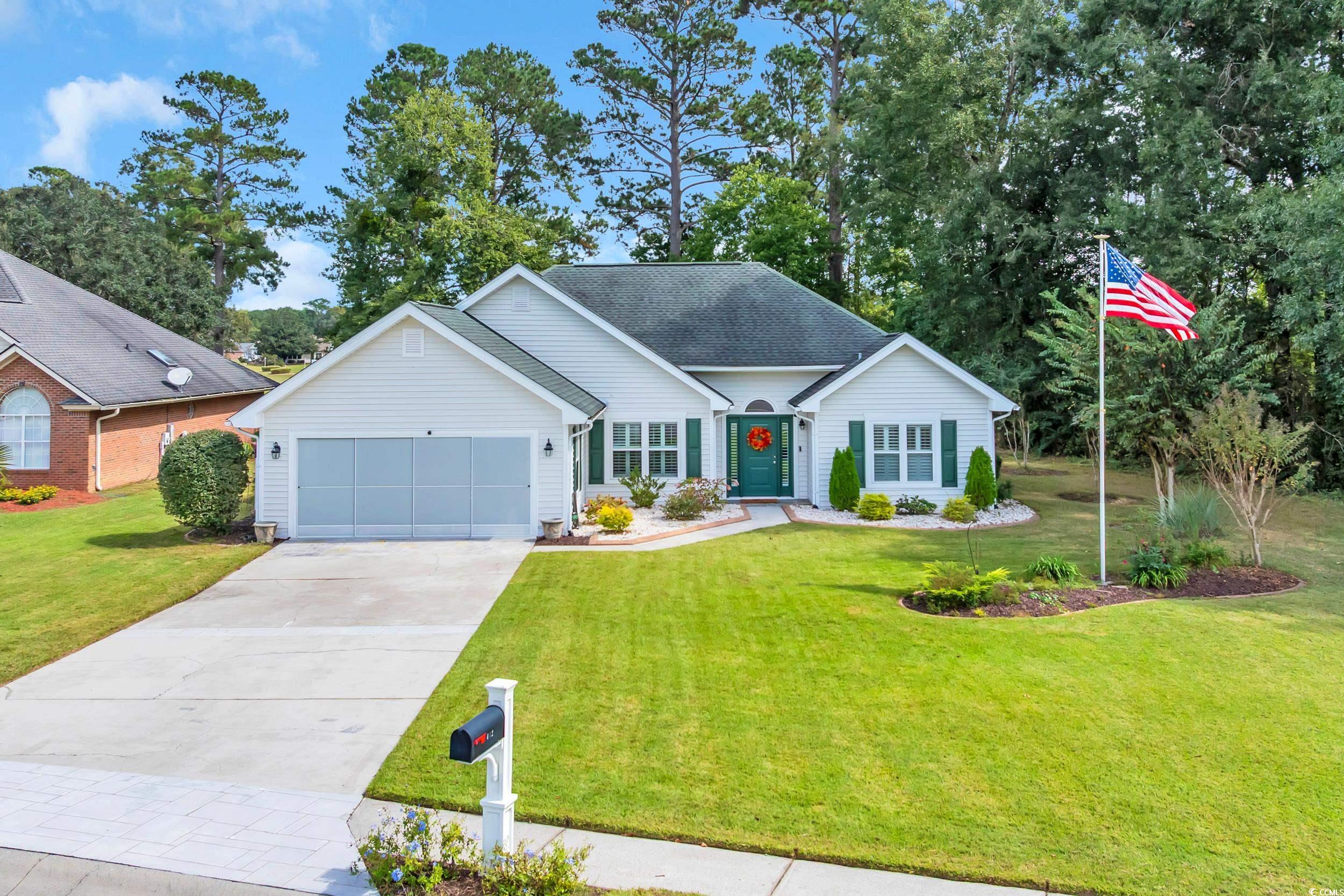 442 Deer Watch Circle Longs, SC 29568 - Photo 1 of 40 Ranch-style house featuring driveway, a garage, and a front yard