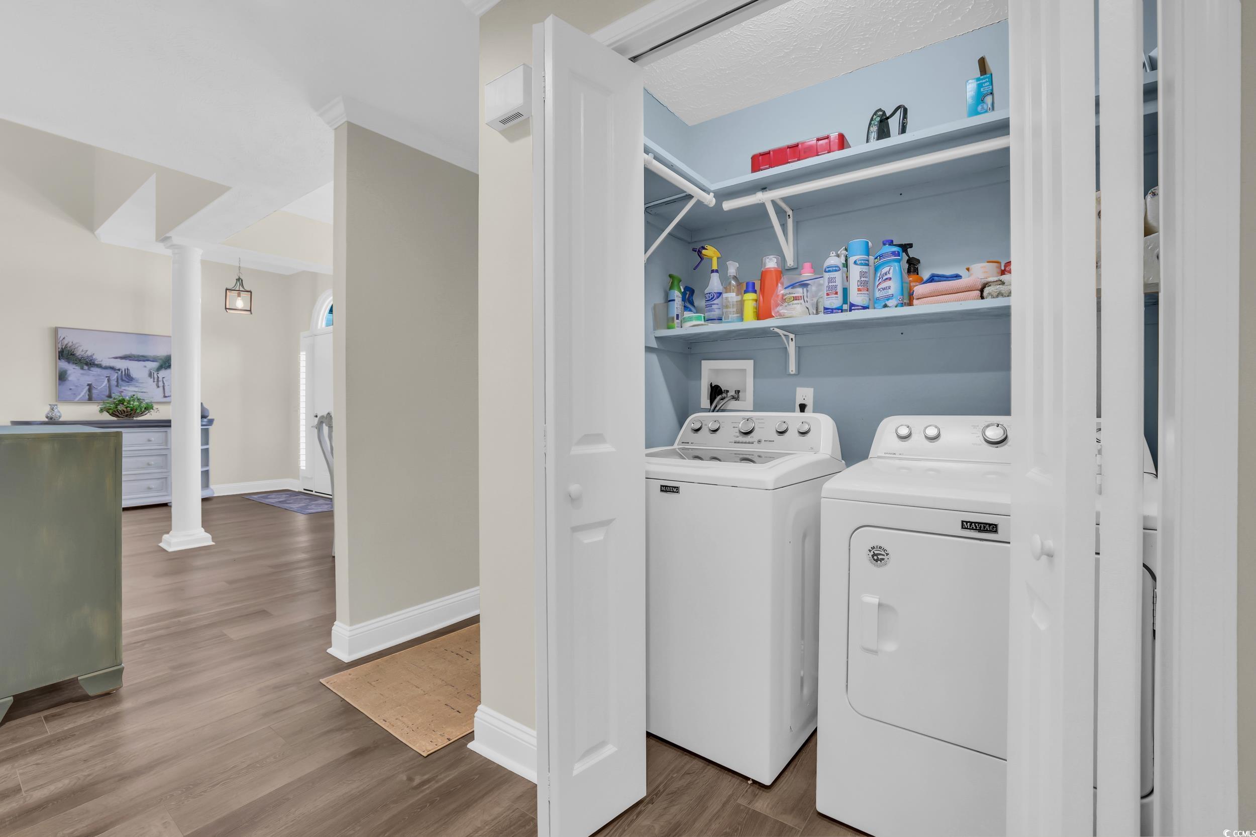 442 Deer Watch Circle Longs, SC 29568 - Photo 21 of 40 Laundry area with wood finished floors, separate washer and dryer, and decorative columns