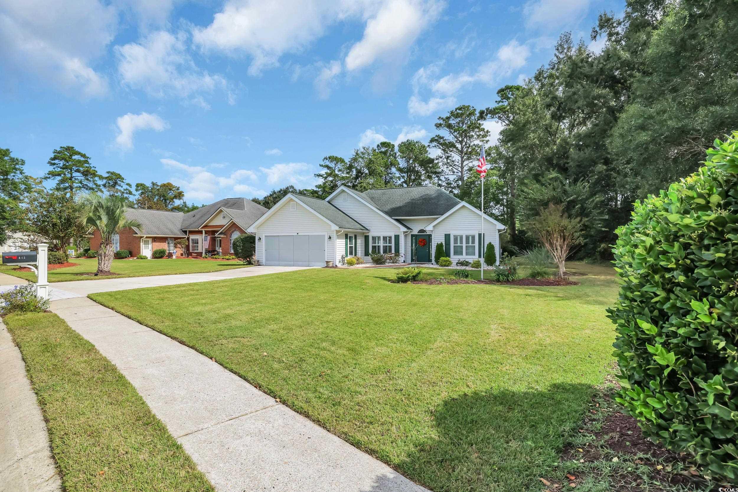 442 Deer Watch Circle Longs, SC 29568 - Photo 28 of 40 Ranch-style home featuring a front yard, concrete driveway, and an attached garage